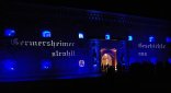 Ludiwgstor Germersheim illuminiert mit dem Text "Germersheimer Geschichte strahlt aus"